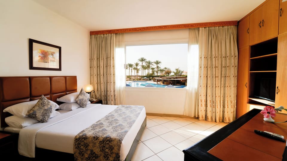 Minibar, in-room safe, iron/ironing board, free cribs/infant beds