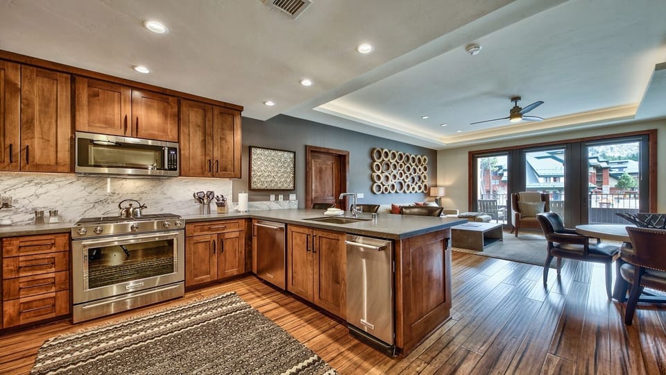 Condo, 2 Bedrooms | Private kitchen | Full-size fridge, microwave, oven, stovetop