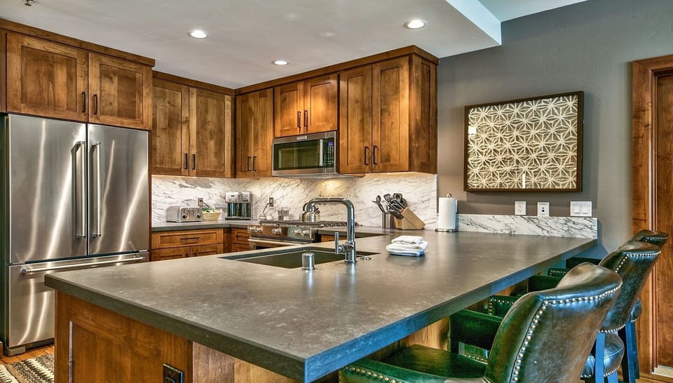 Condo, 2 Bedrooms | Private kitchen | Full-size fridge, microwave, oven, stovetop