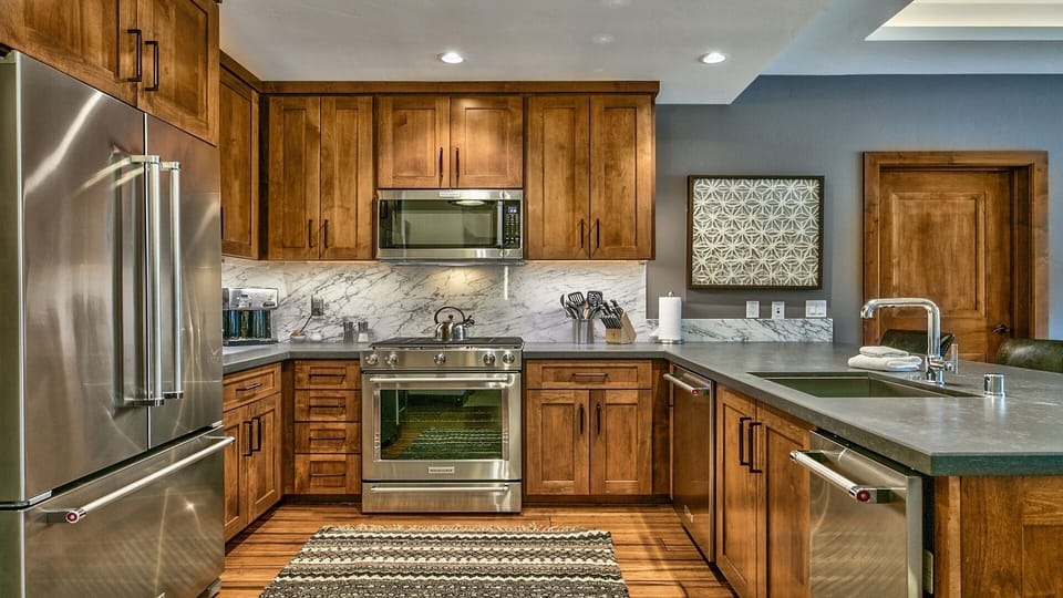 Condo, 2 Bedrooms | Private kitchen | Full-size fridge, microwave, oven, stovetop