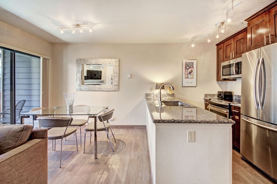 Condo, 2 Bedrooms | Private kitchen | Fridge, microwave, oven, dishwasher
