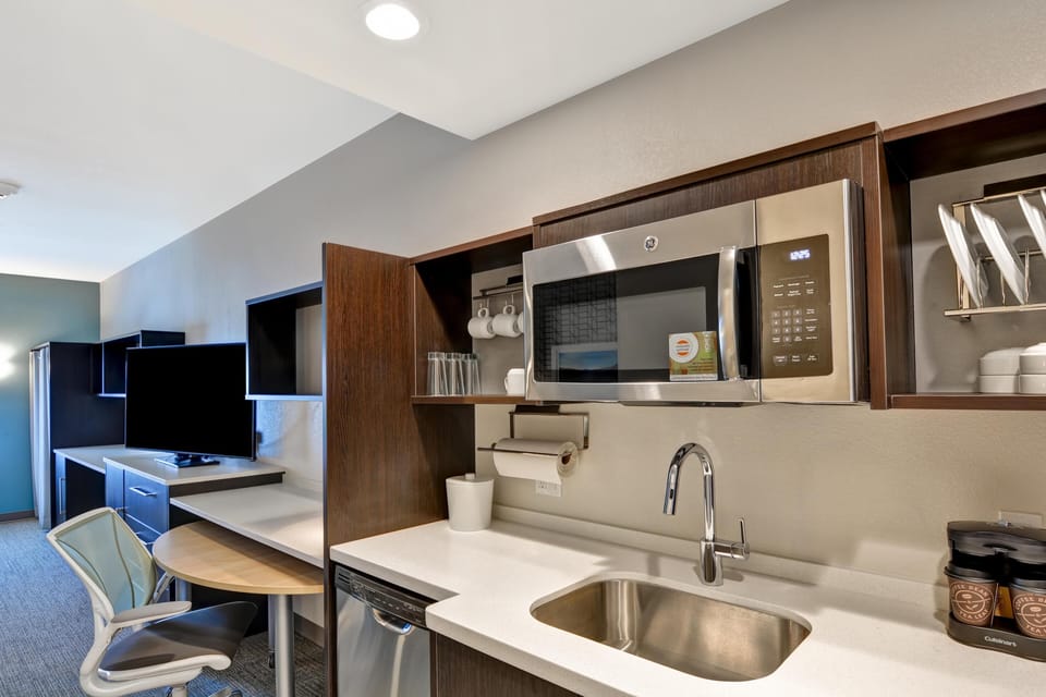Individually furnished, desk, laptop workspace, blackout drapes