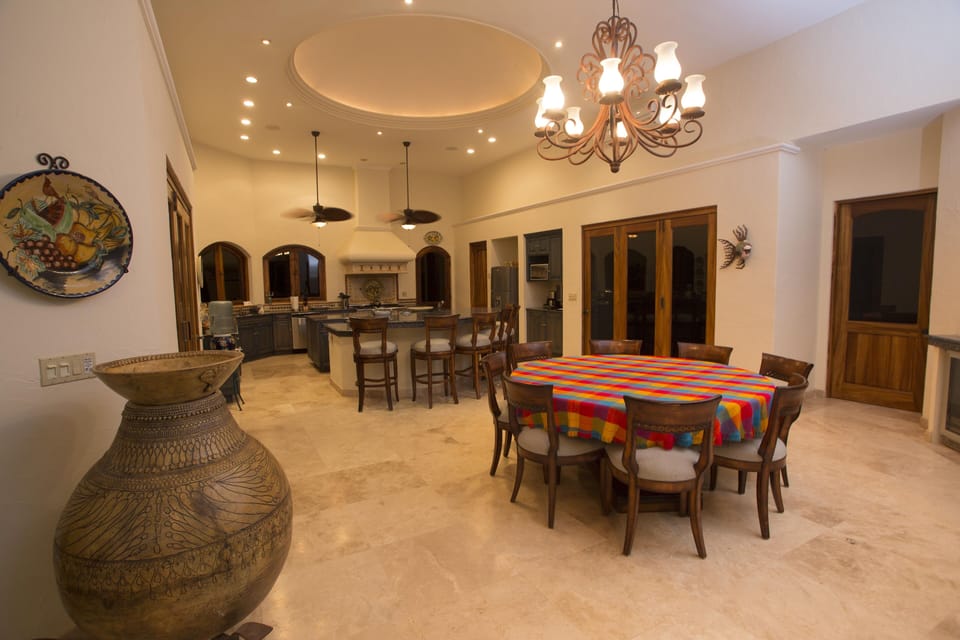 Kitchen and indoor dinning areas at night