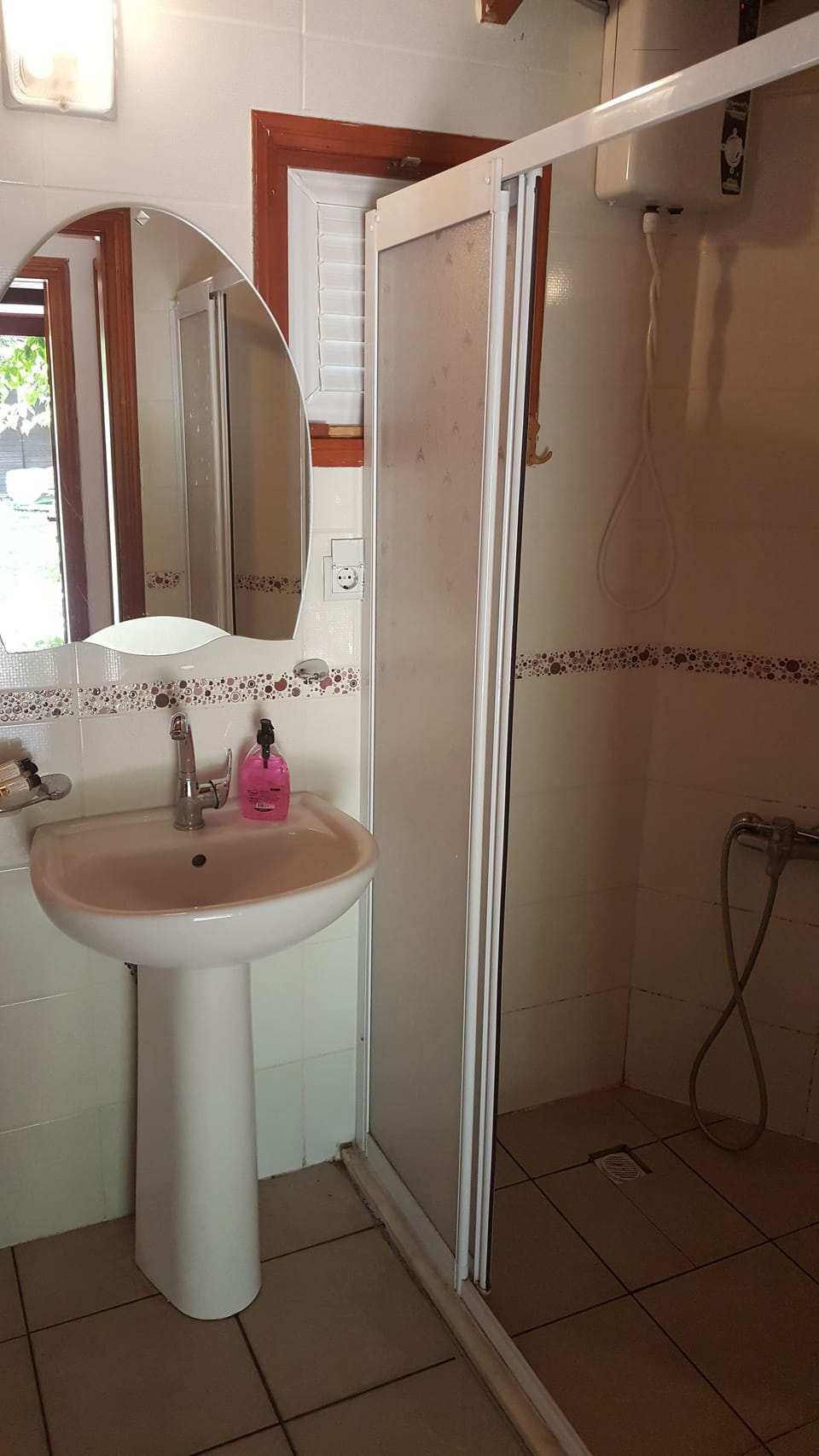 Shower, hair dryer (on request), towels, soap