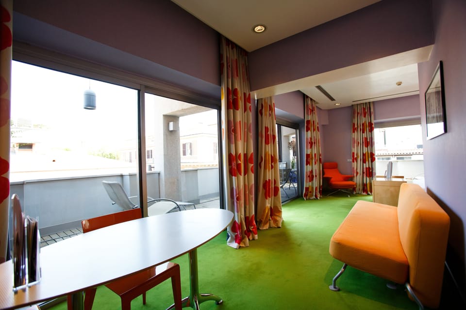 Suite Junior con Moquette o Pavimento | Living area | Smart TV