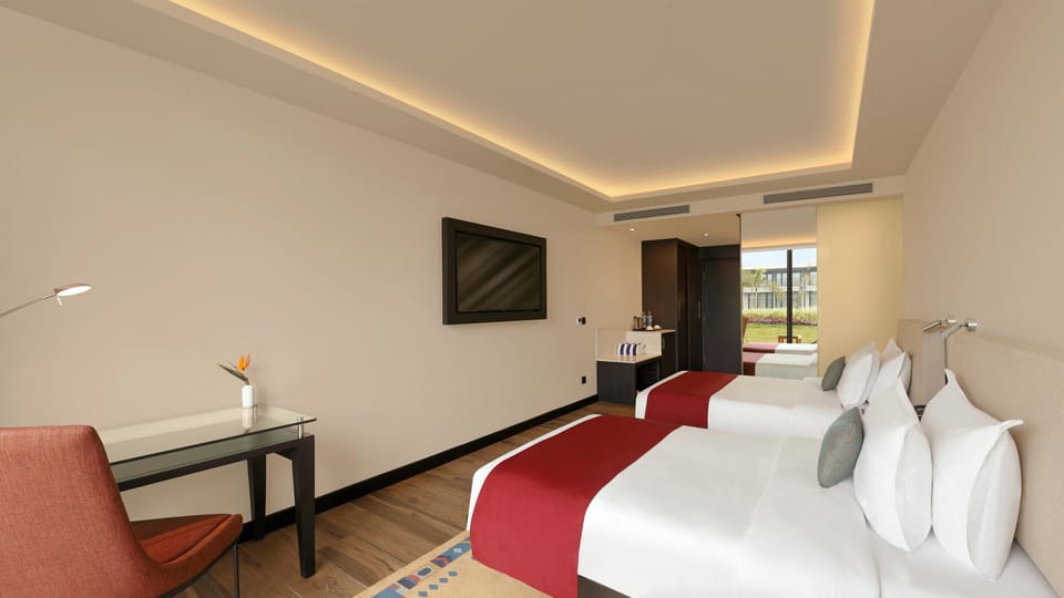 Premium bedding, pillowtop beds, minibar, in-room safe