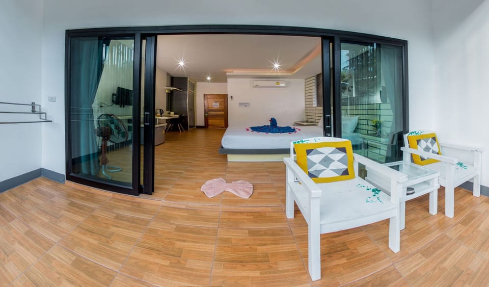Superior Double Room, Pool View | Living area | 32-inch flat-screen TV with satellite channels, TV