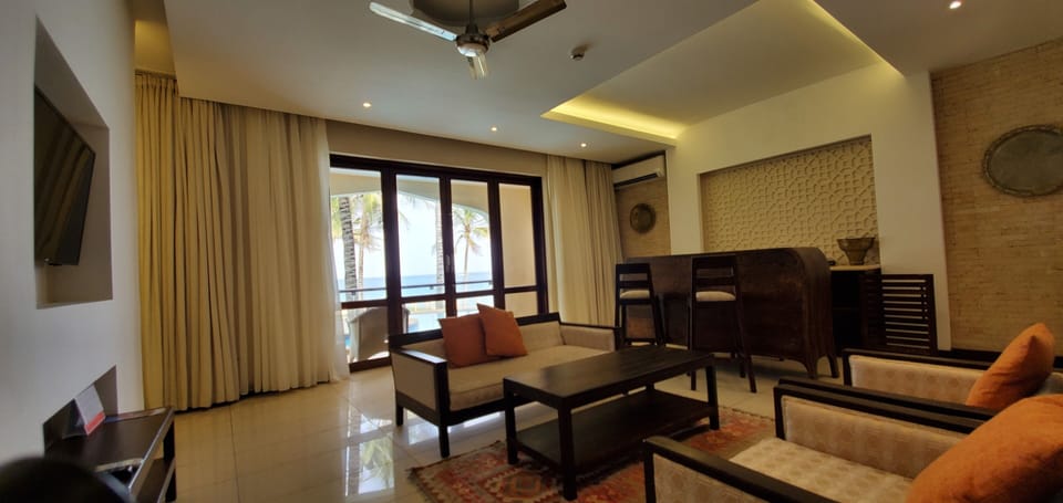 Premier Suite | Living area | Flat-screen TV