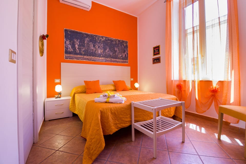 Comfort Quadruple Room | Minibar, in-room safe, individually decorated, individually furnished