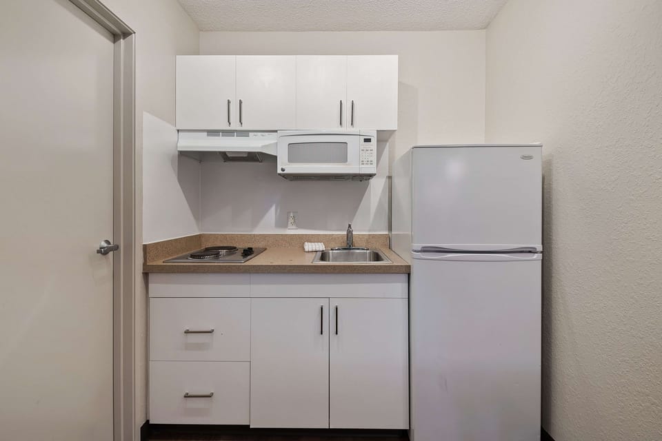 Studio, 1 Queen Bed, Non Smoking (Hearing Accessible) | Private kitchen | Fridge, microwave, stovetop, coffee/tea maker