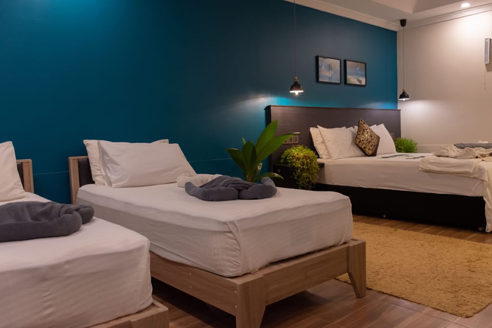 Family Double Room, Non Smoking | Down comforters, minibar, in-room safe, individually decorated