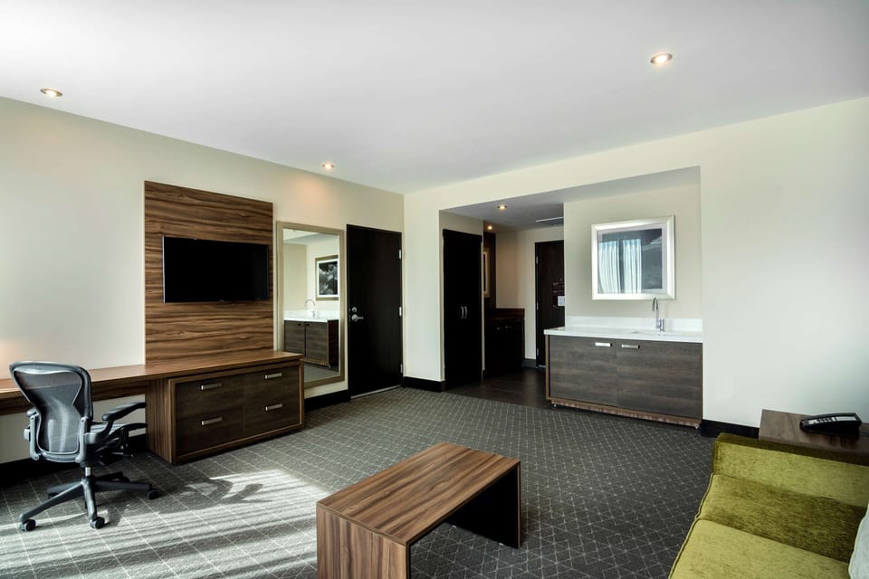 Suite, 1 Bedroom | In-room safe, desk, blackout drapes, iron/ironing board