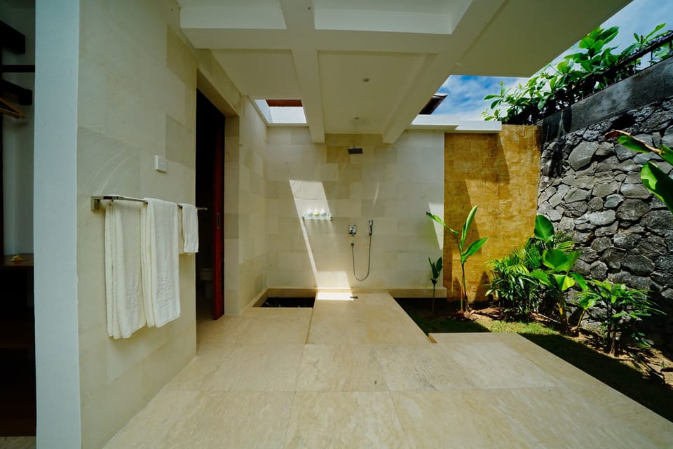 Shower, free toiletries, hair dryer, bathrobes