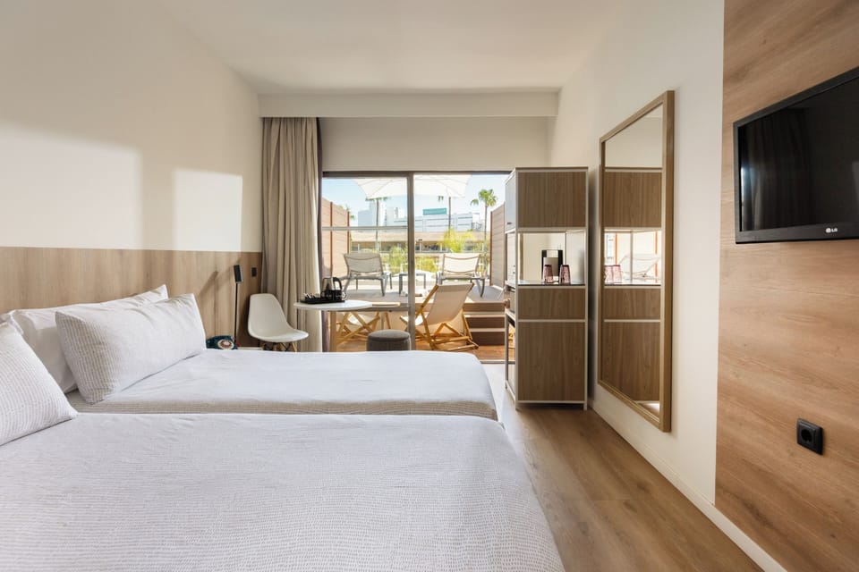 The Innside Room Pool View Solarium | In-room safe, laptop workspace, blackout drapes, soundproofing