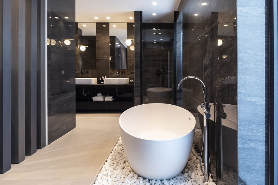 Designer toiletries, hair dryer, bathrobes, slippers