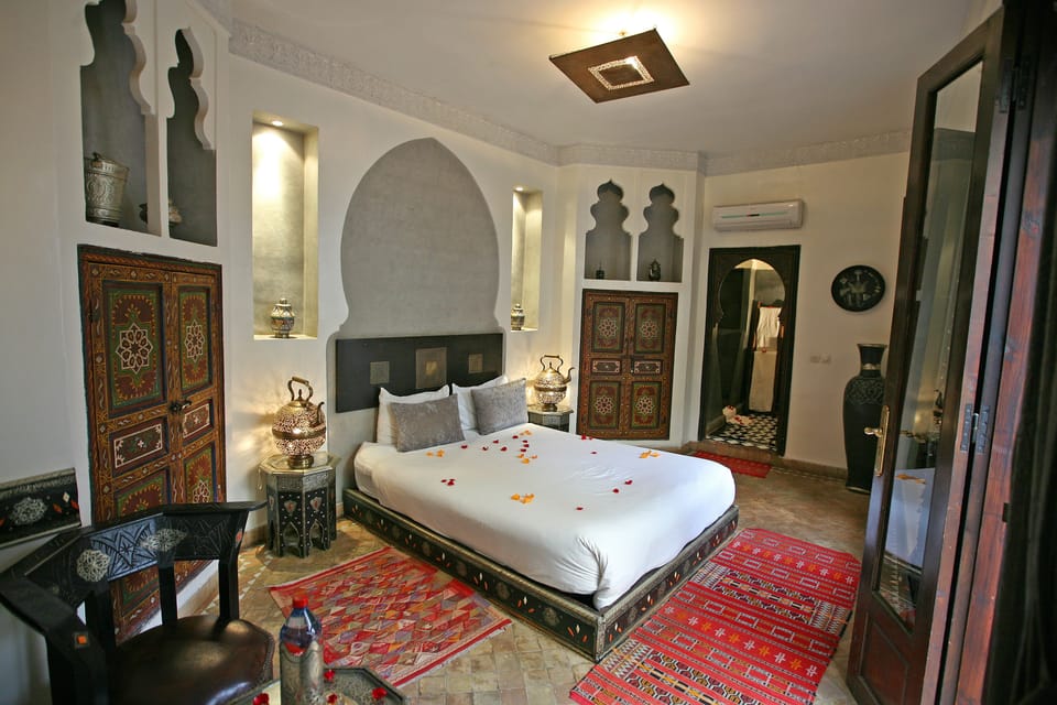 Deluxe Double Room | Pillowtop beds, in-room safe, individually decorated, iron/ironing board