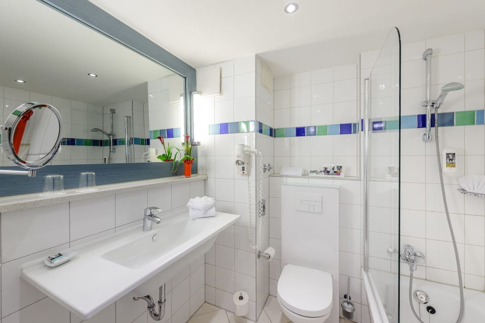 Eco-friendly toiletries, hair dryer, towels