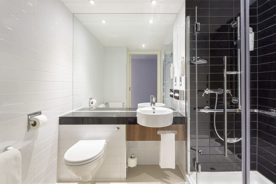 Desk, blackout drapes, iron/ironing board, free cribs/infant beds