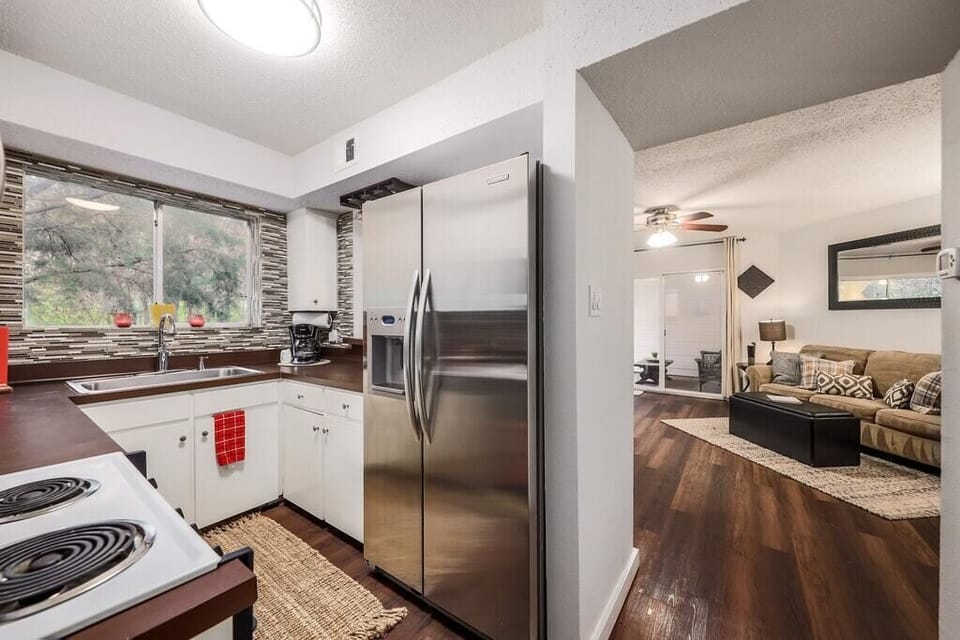 View of kitchen 
Stocked with essentials to cook and entertain. 
