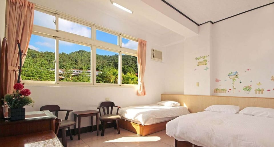 Standard Triple Room | Desk, laptop workspace, blackout drapes, free WiFi
