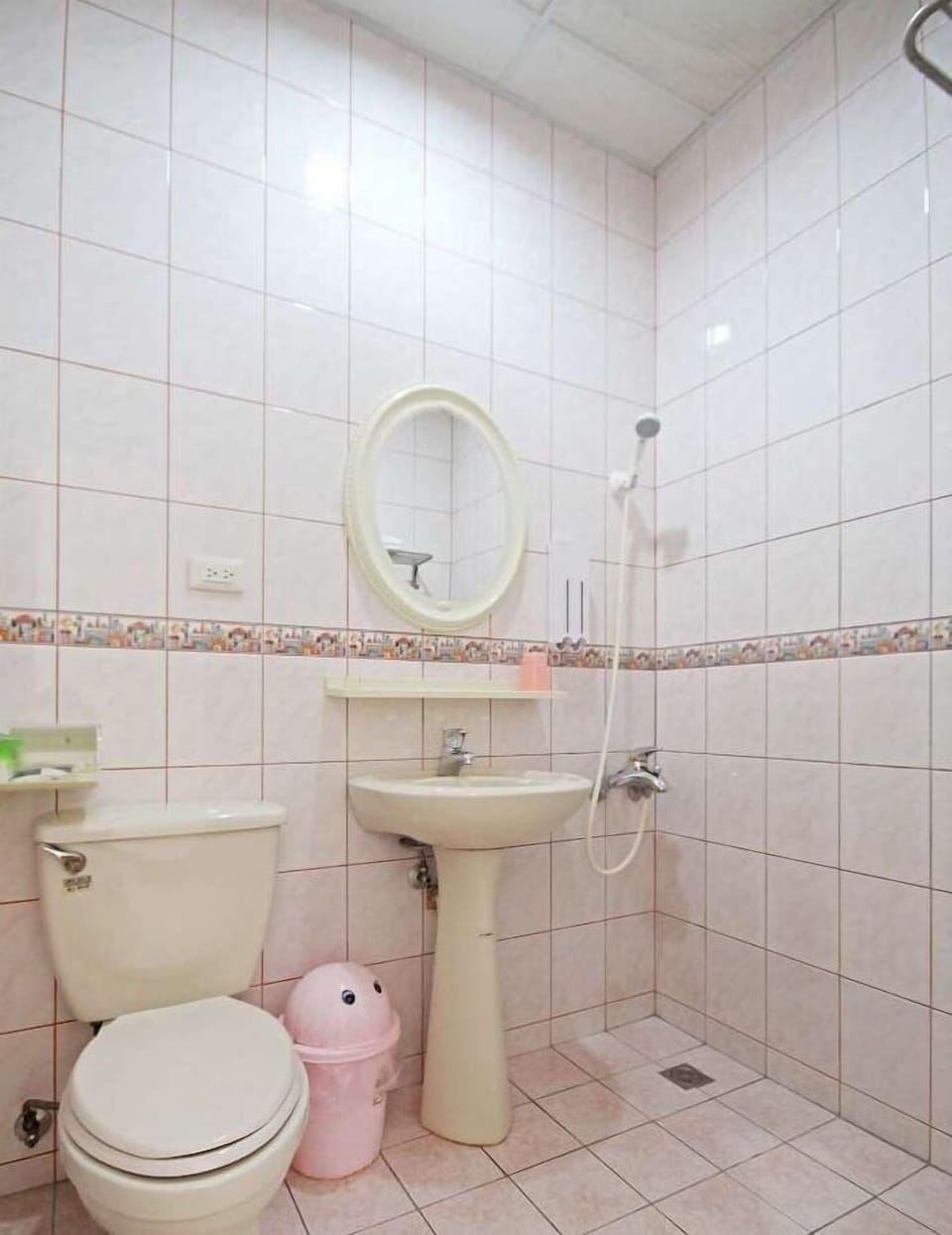 Shower, free toiletries, hair dryer, slippers