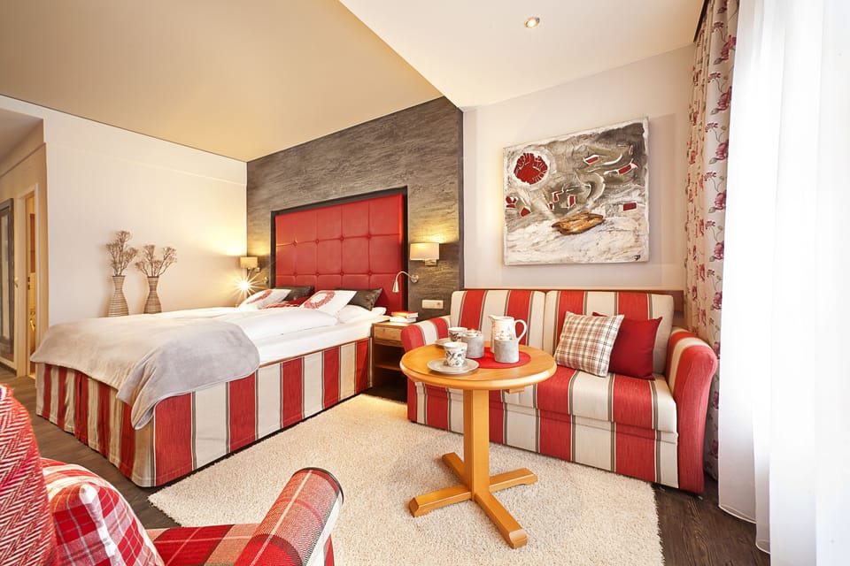 Superior Double Room | Living area | Flat-screen TV