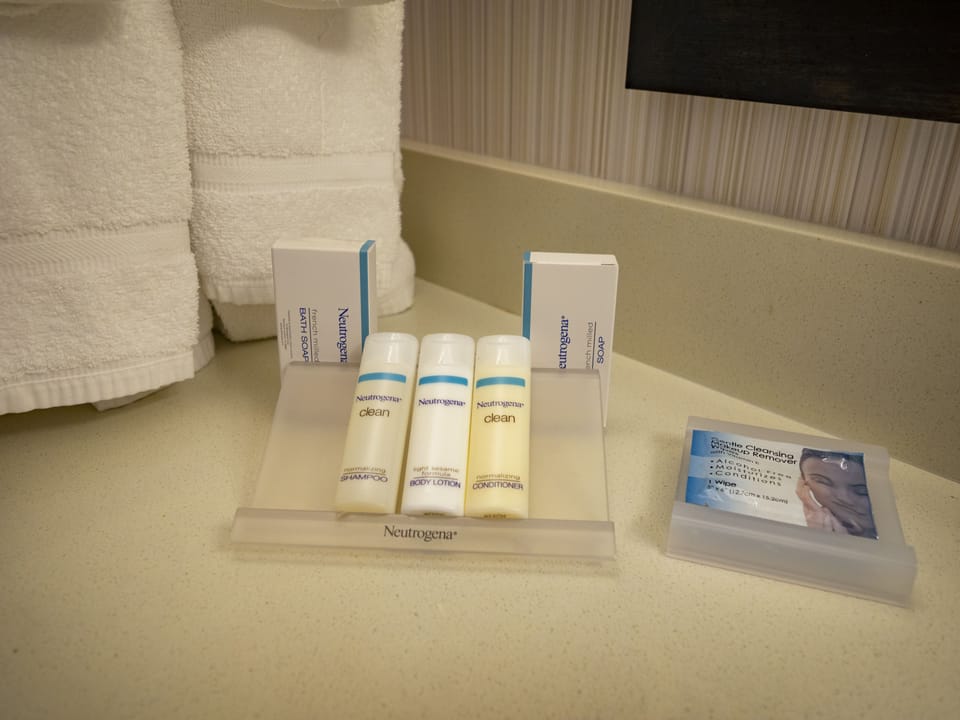 Premium bedding, down comforters, desk, laptop workspace