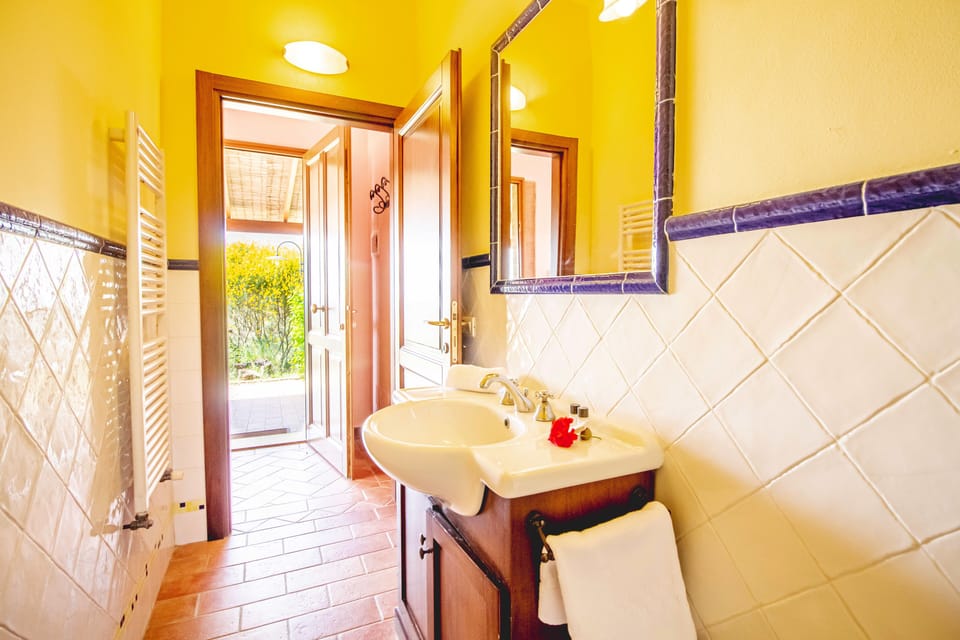 Triple Room, Hill View | Bathroom | Shower, towels, soap, shampoo