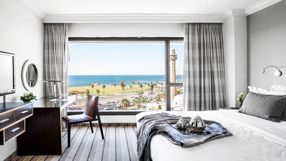 Atrium Suite, 1 Bedroom | Minibar, in-room safe, desk, laptop workspace