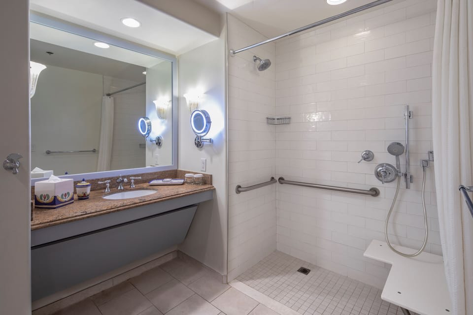 Room, 2 Queen Beds, Roll-in Shower, Garden View (Universal Express Unlimited^ included) | Bathroom | Free toiletries, hair dryer, bathrobes, towels