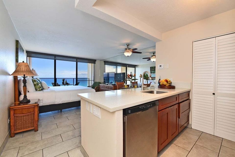 A well-appointed kitchen with ample counter space and stunning views of the Pacific