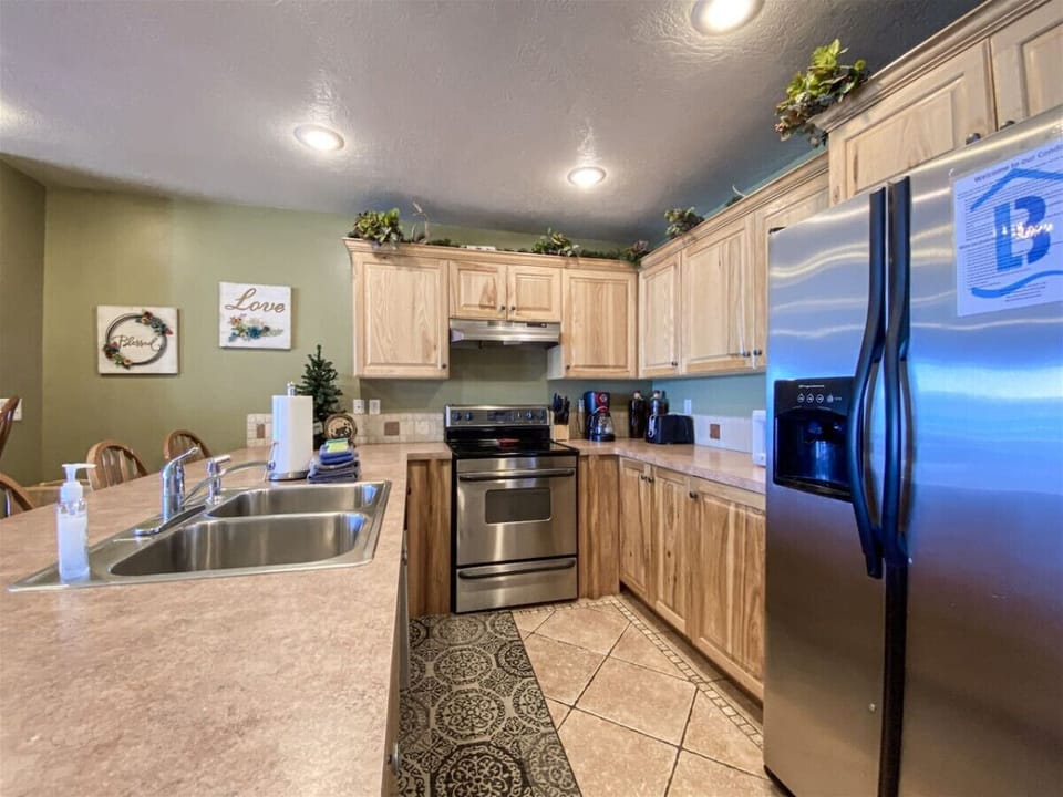 Modern kitchen with stainless appliances and ample counter space