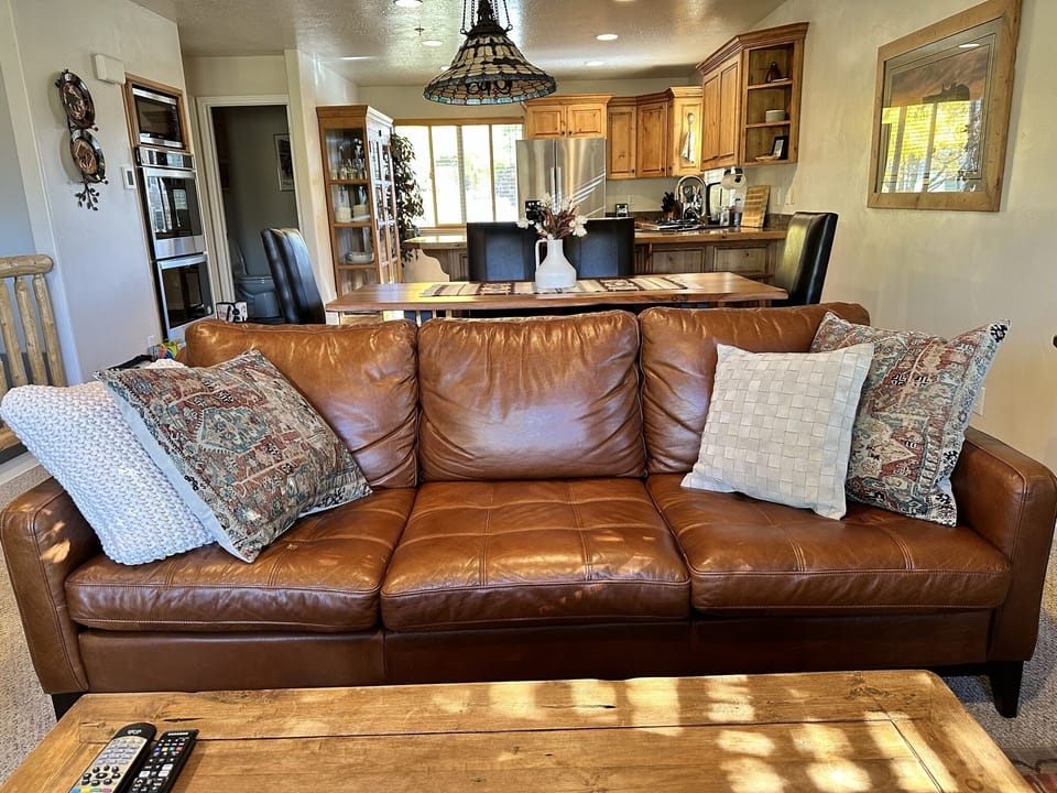 New leather couches with luxury pillows for your cozy enjoyment!
