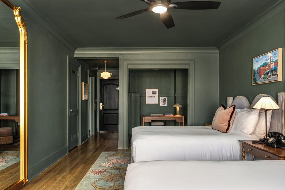 Deluxe Room, 2 Queen Beds | Pillowtop beds, in-room safe, blackout drapes, iron/ironing board