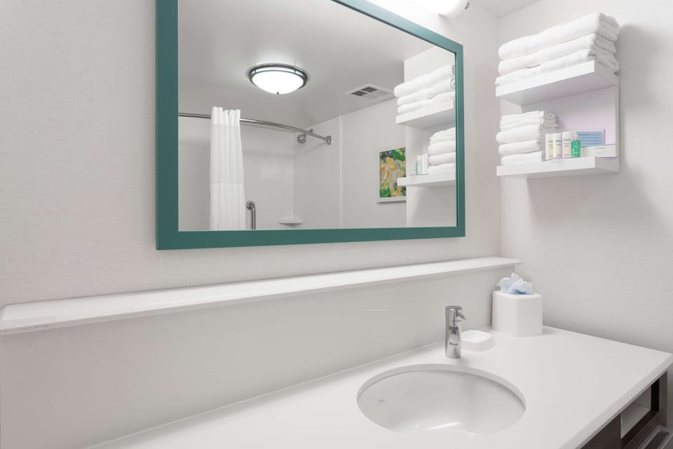 Bathtub, hair dryer, towels