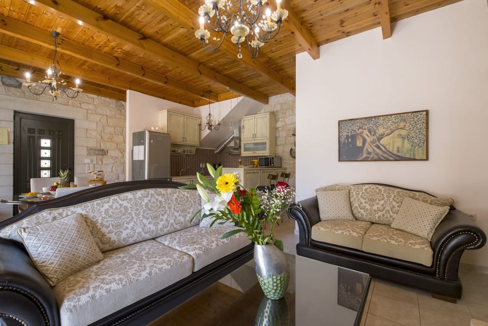 Superior Villa, 2 Bedrooms, Private Pool (Christy) | Living area | 42-inch flat-screen TV with satellite channels, Smart TV, fireplace