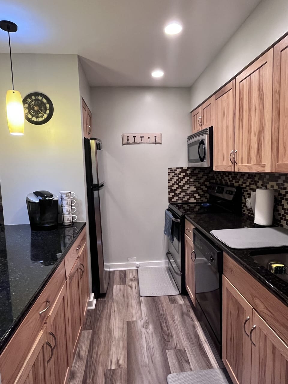 Fully stocked kitchen with cookware, basic spices and K-cups