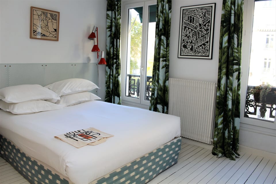 Standard Double Room | Minibar, in-room safe, desk, iron/ironing board