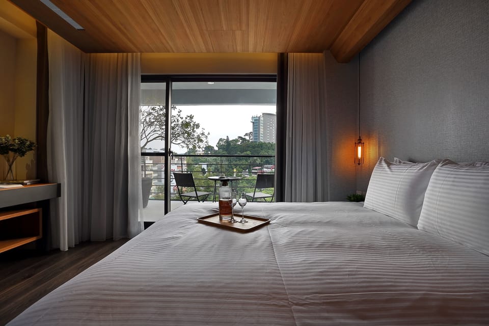 Deluxe Double Room, 1 Queen Bed, Balcony, Mountain View | Minibar, individually decorated, desk, laptop workspace