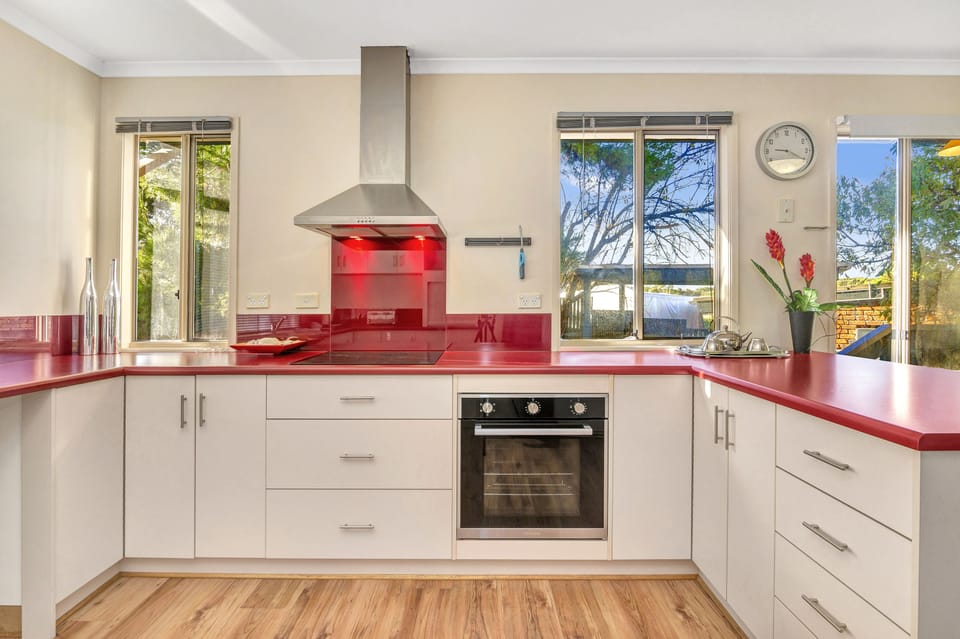 All Decked Out | Private kitchen | Fridge, microwave, oven, stovetop
