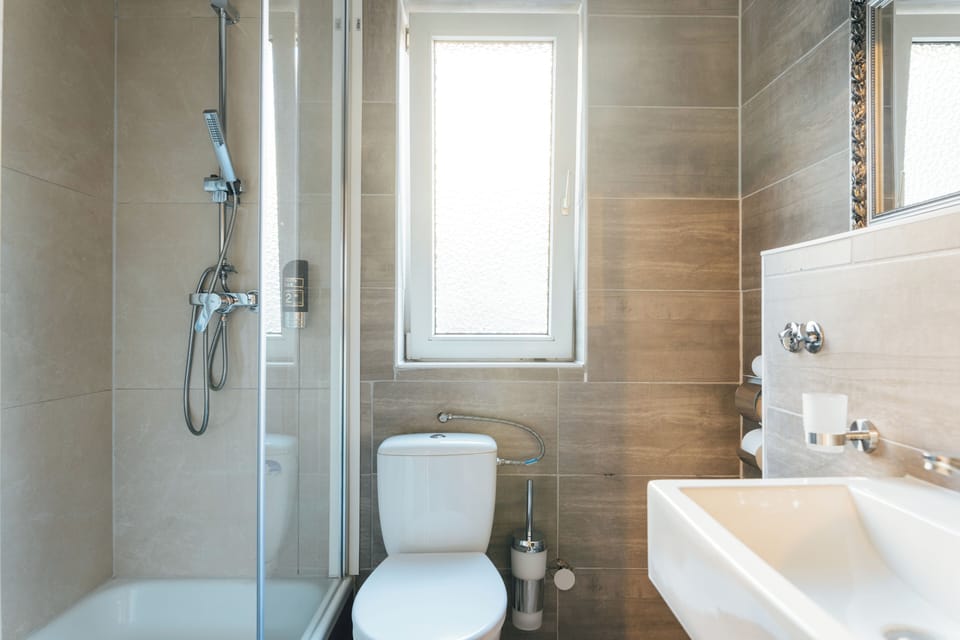 Shower, free toiletries, hair dryer, towels