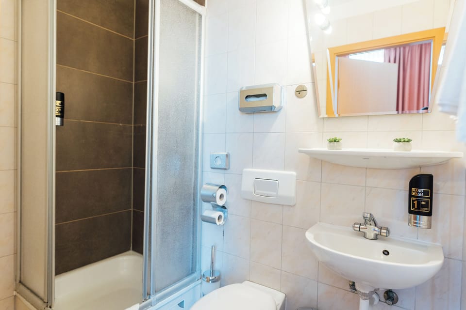 Shower, free toiletries, hair dryer, towels