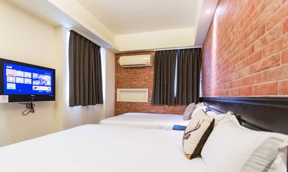 Standard Quadruple Room | Desk, blackout drapes, soundproofing, free WiFi