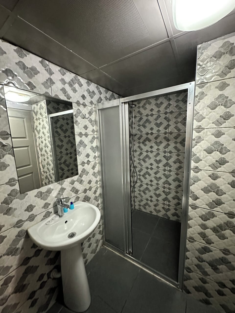 Standard Double Room | Bathroom | Shower, free toiletries, hair dryer, slippers