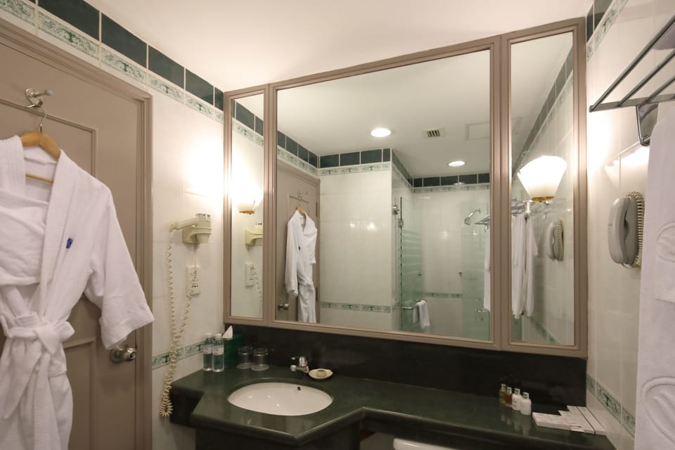 Shower, free toiletries, hair dryer, slippers