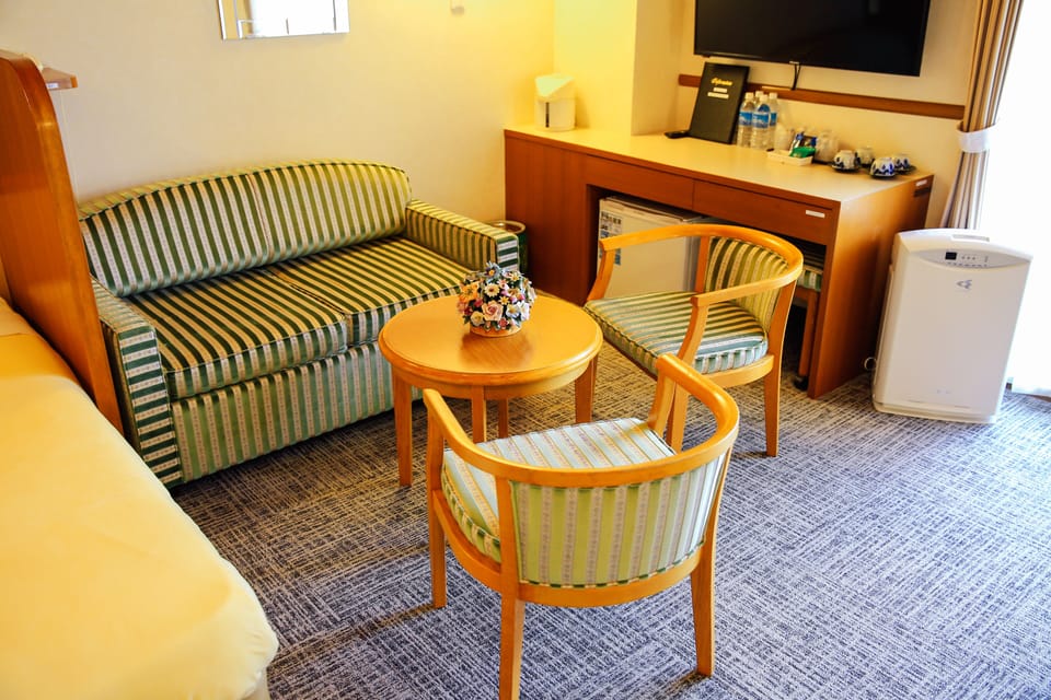 Family Quadruple Room, Non Smoking, Sea View | In-room safe, desk, laptop workspace, blackout drapes