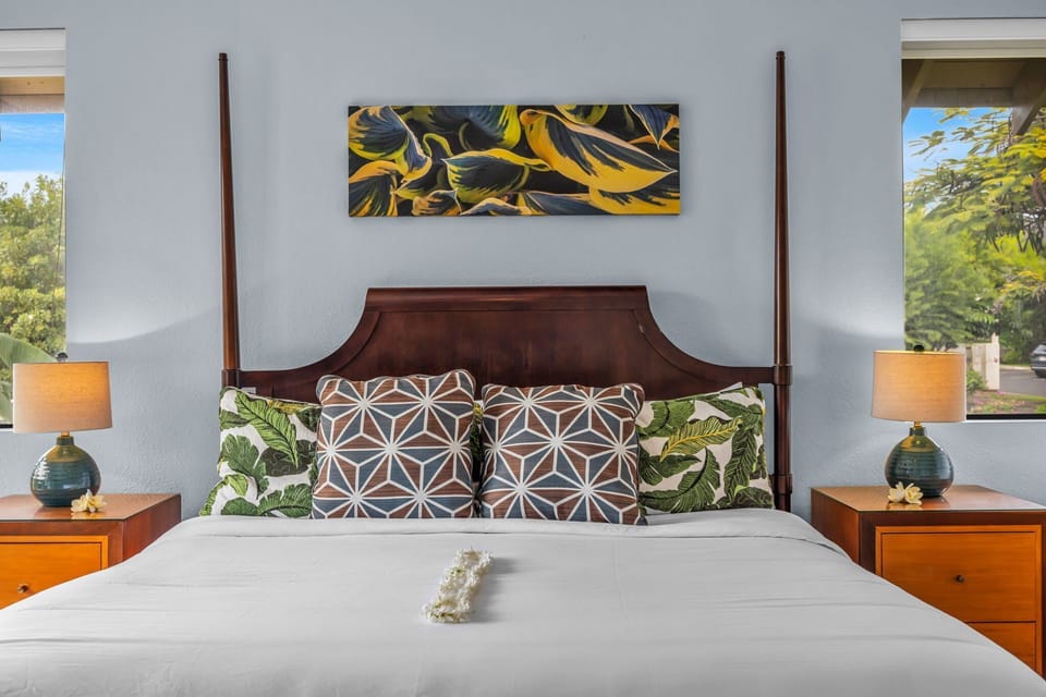 Cozy bedroom featuring a king bed for restful island nights