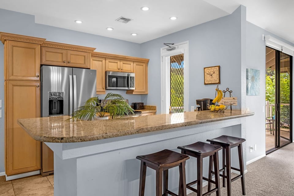 Kitchen island with bar seating perfect for quick breakfast