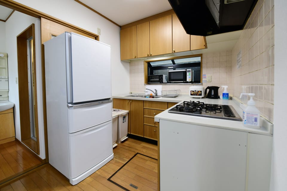 Family House | Private kitchen | Full-size fridge, microwave, stovetop, electric kettle