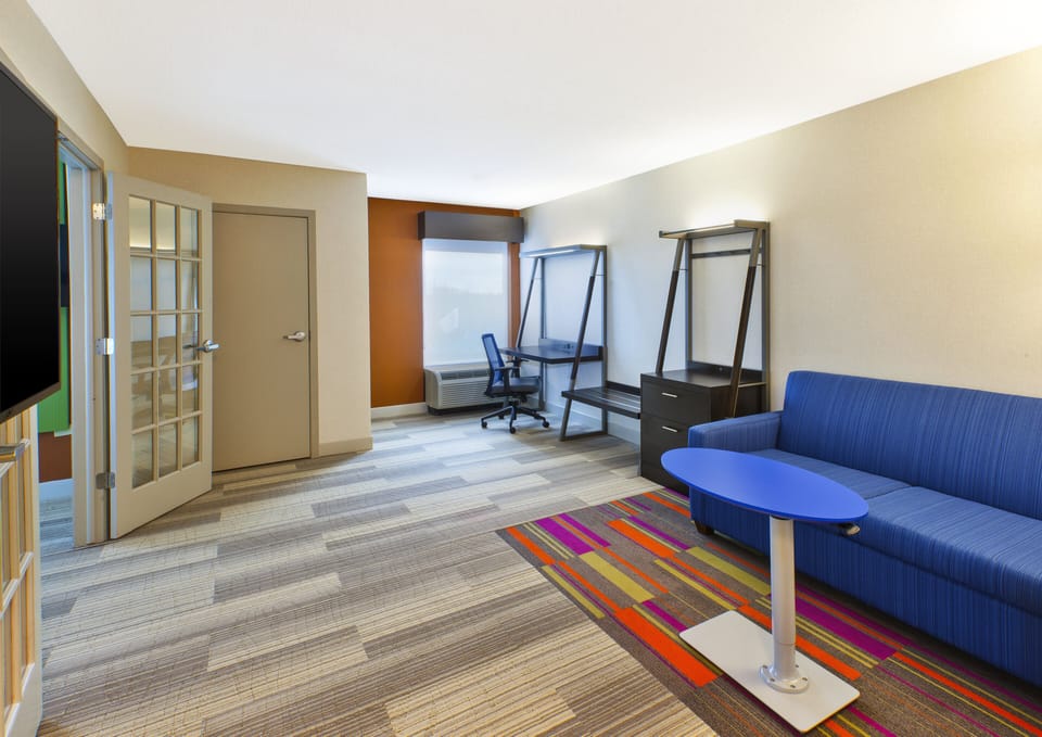 Suite, 1 King Bed | In-room safe, desk, iron/ironing board, free WiFi